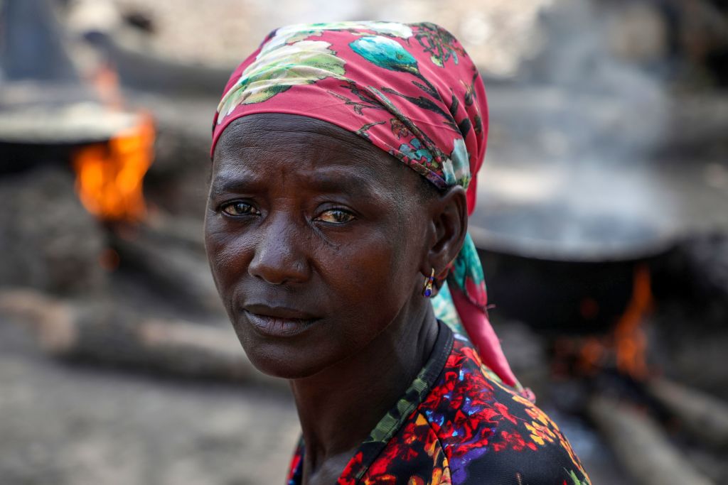 Ladi Kodi sits beside her black soap business in Nigeria 