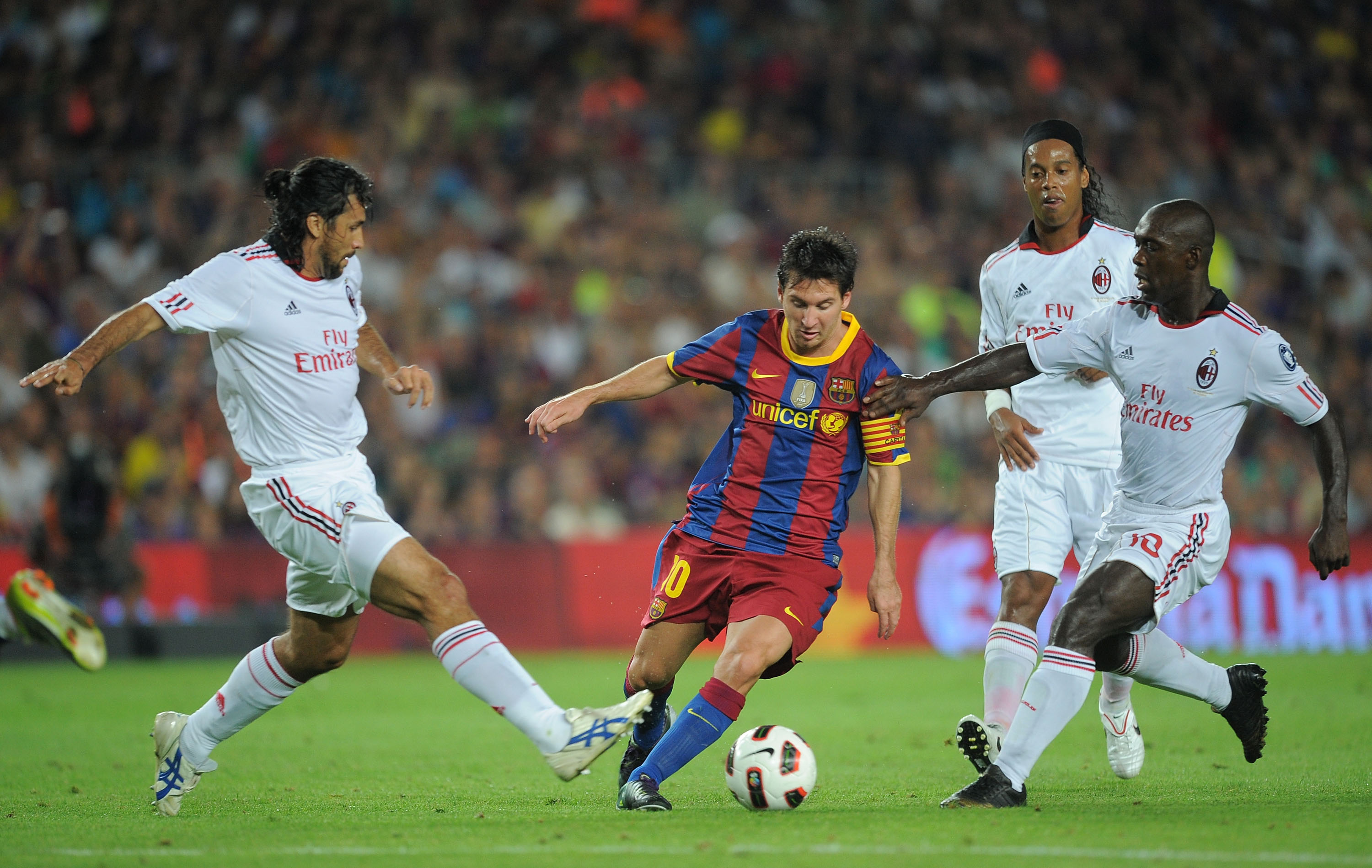 Lionel Messi in action against AC Milan in 2010