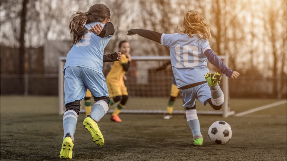 Children playing football