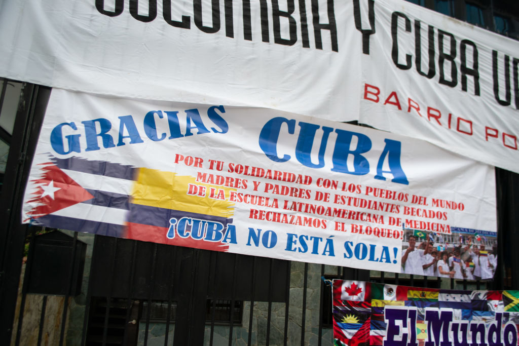 Cubans protest at the Cuban Embassy in Colombia
