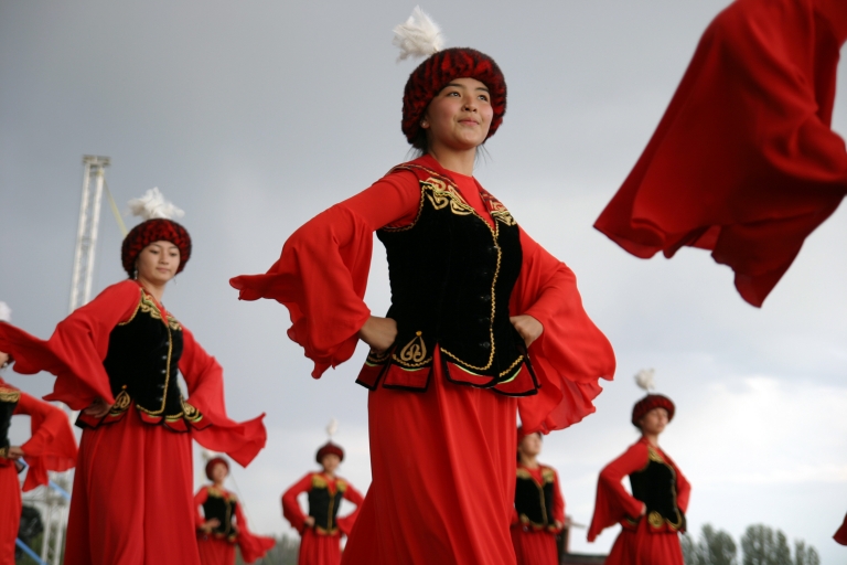 A girl takes part in a traditional dance