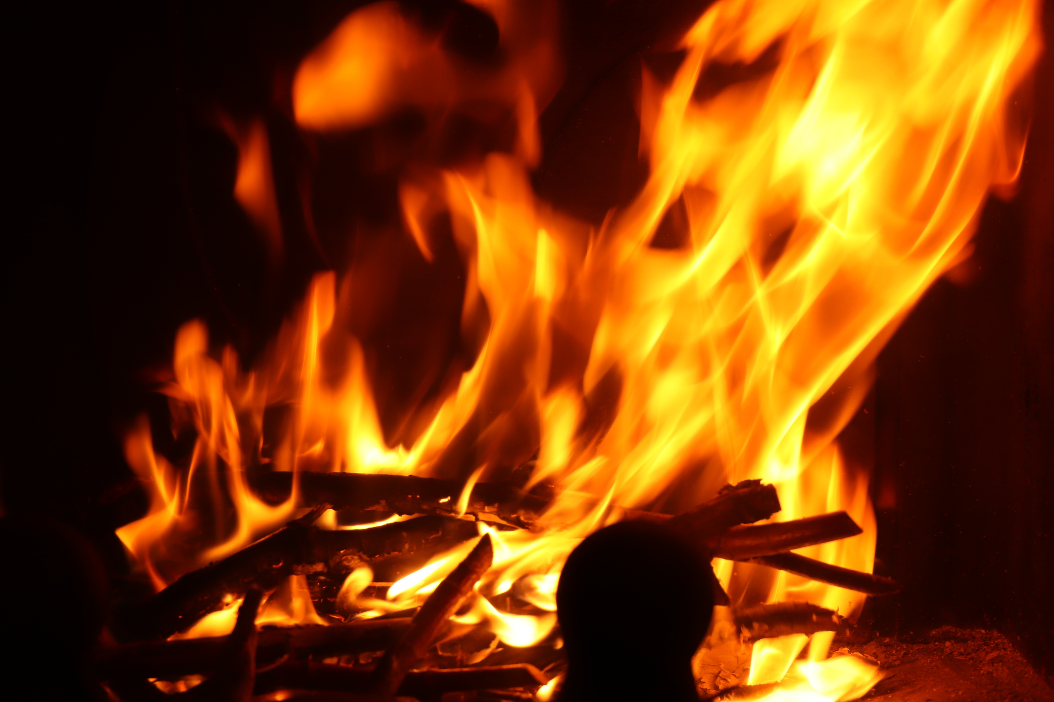 Wood being burned by flames