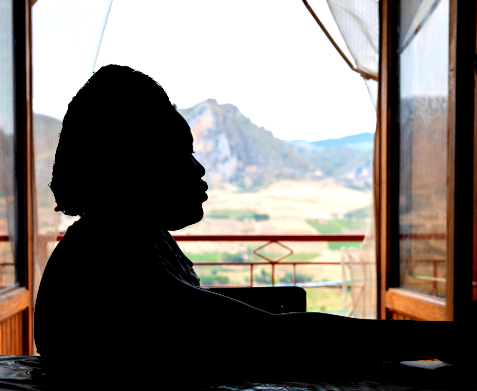 The silhouette of a woman at a shelter for Nigerian women in Sicily, Italy