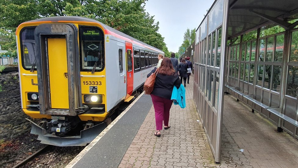 People at Cardiff Bay station 