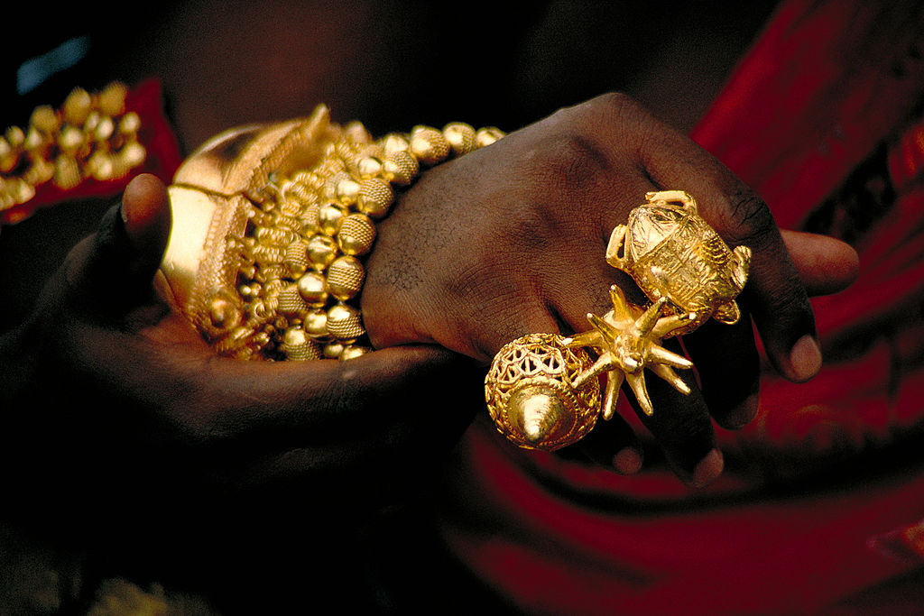 Hand with gold jewellery