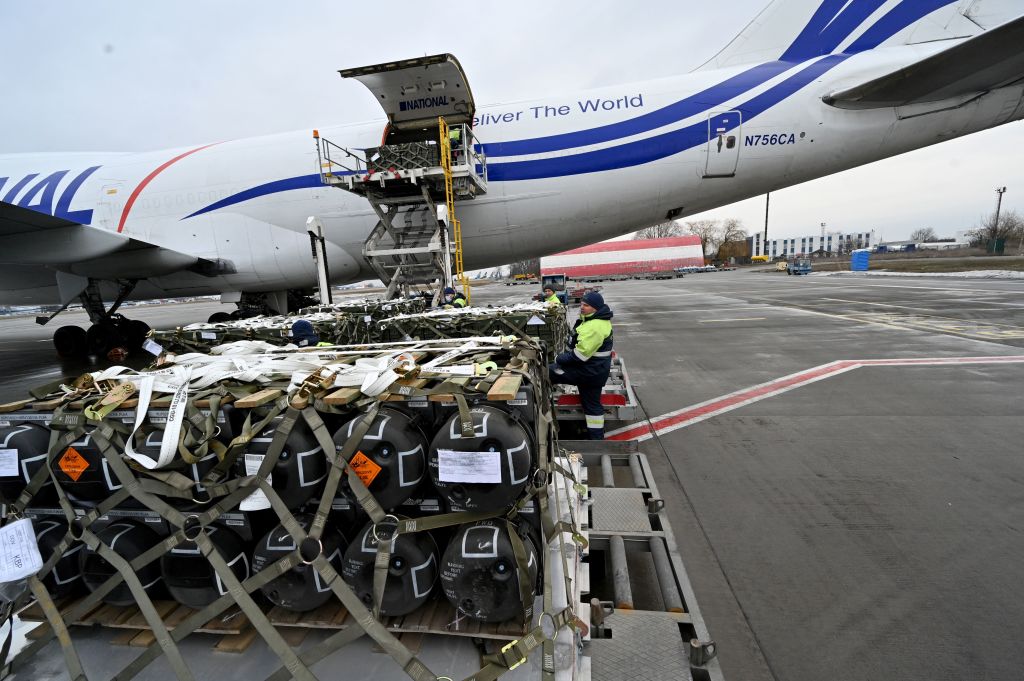 Employees unload a Boeing 747-412 plane with the FGM-148 Javelin, American man-portable anti-tank missile provided by US to Ukraine 