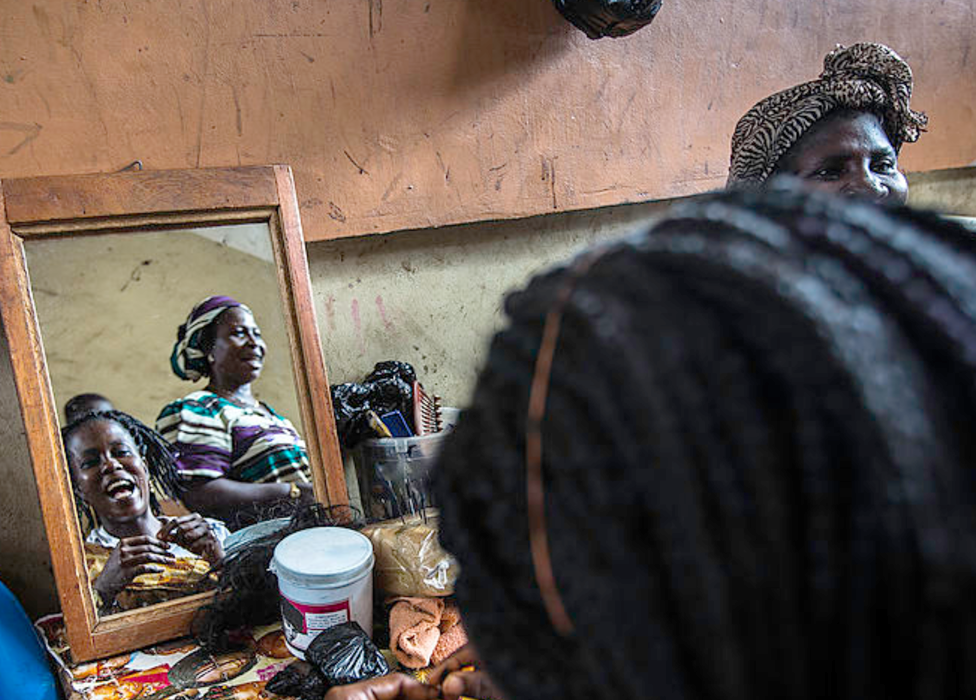 Women in a hairdresser's salon in Kumasi, Ghana