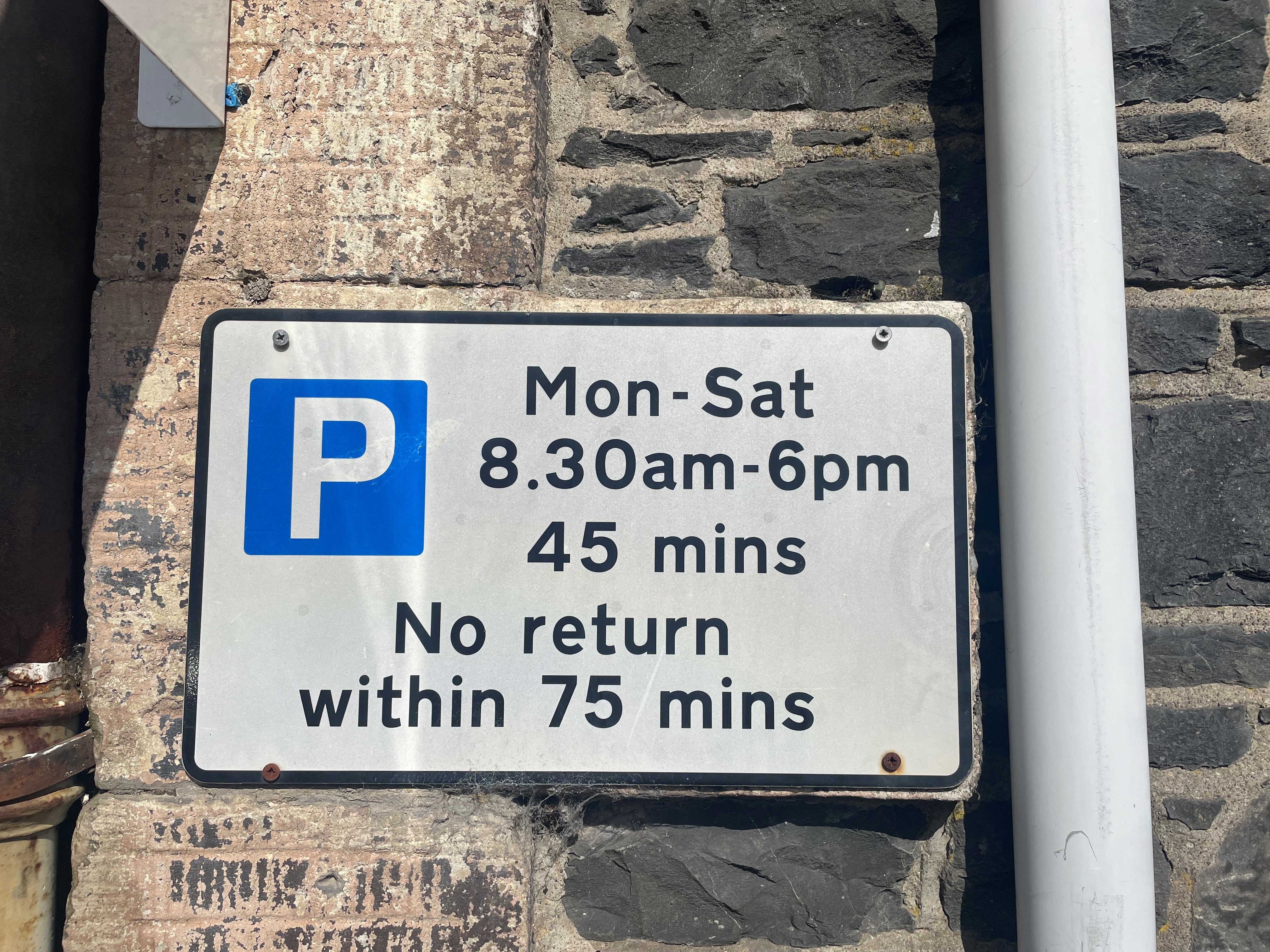 Parking restriction sign