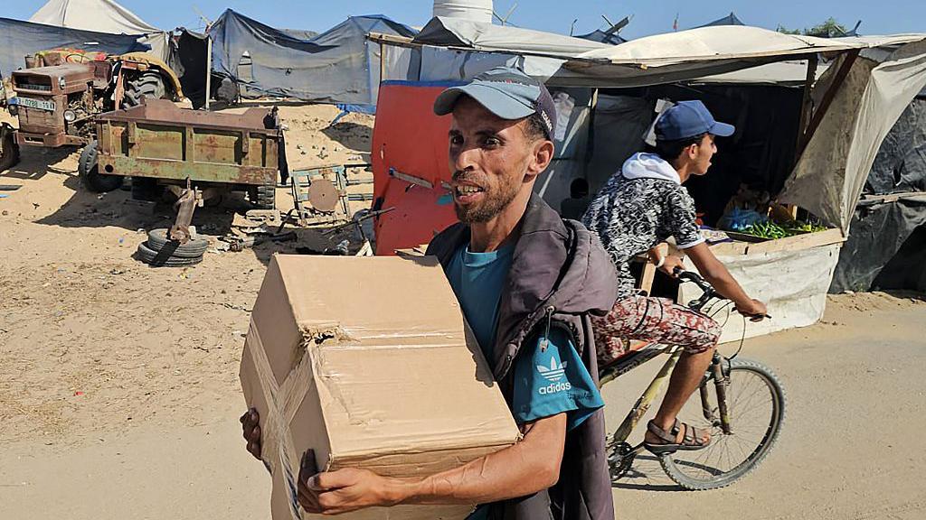 Controversial US-backed group says it has begun aid distribution in Gaza Controversial US-backed group says it has begun aid distribution in Gaza