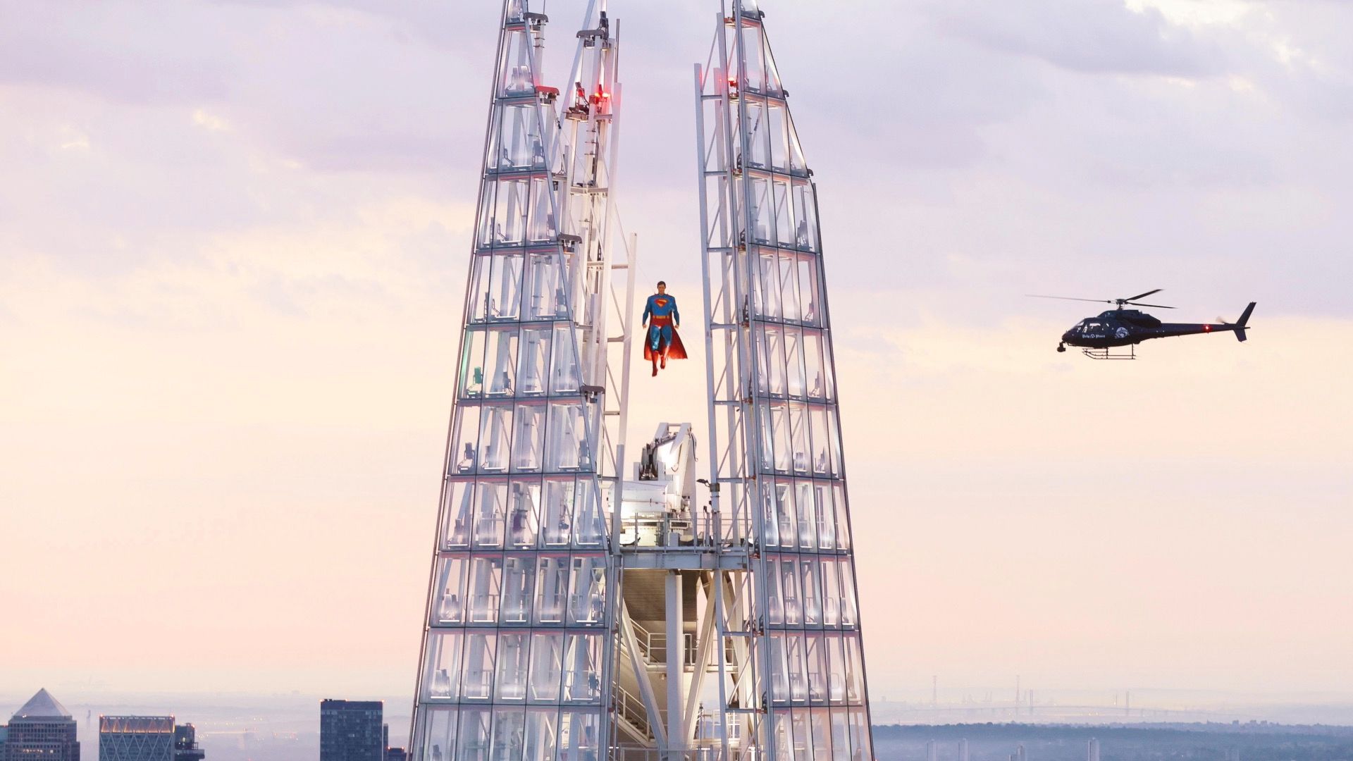 Superman figure levitates from the peak of Londons Shard Superman figure levitates from the peak of Londons Shard