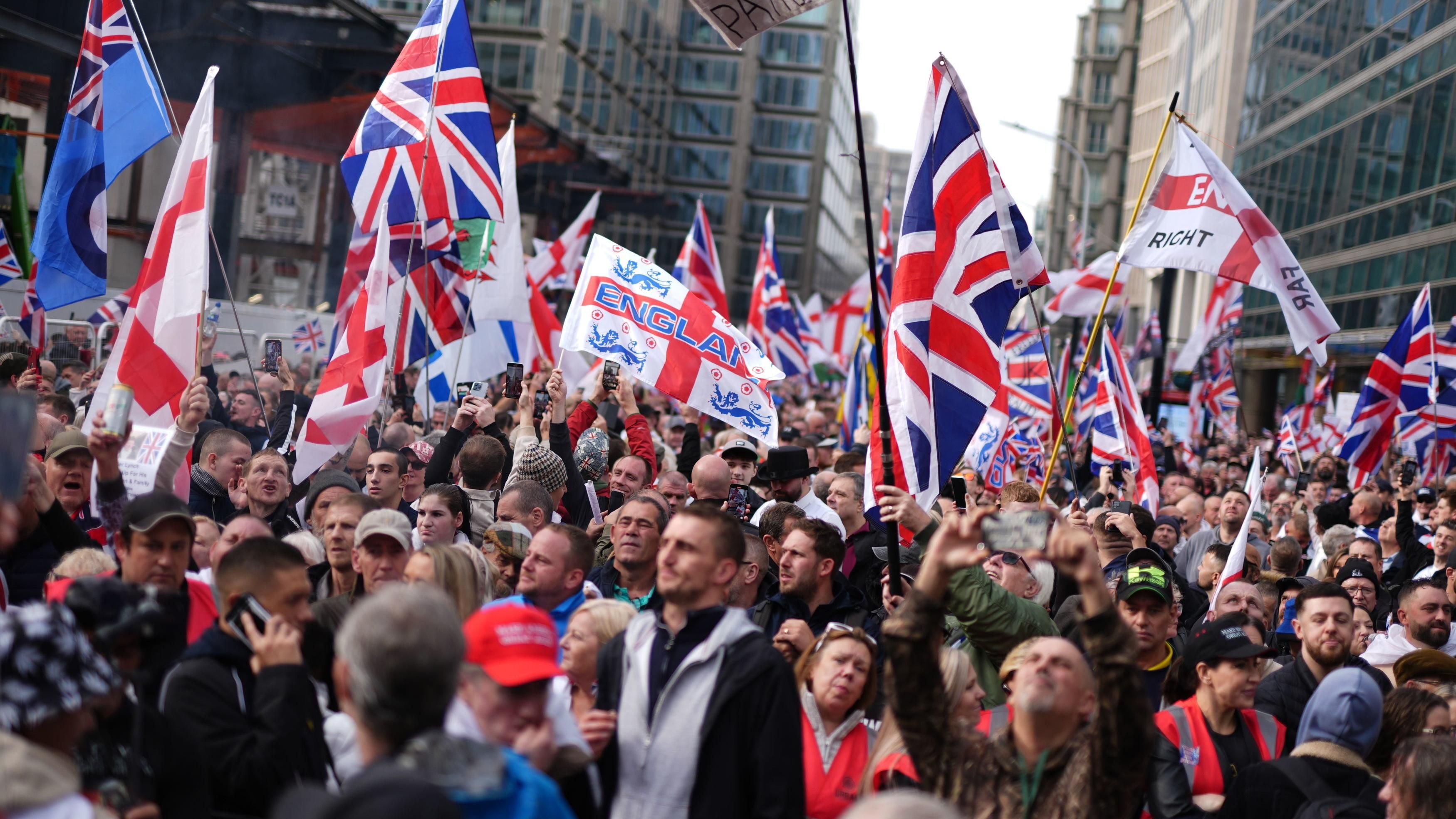 Thousands march in London over deaths in custody and riots