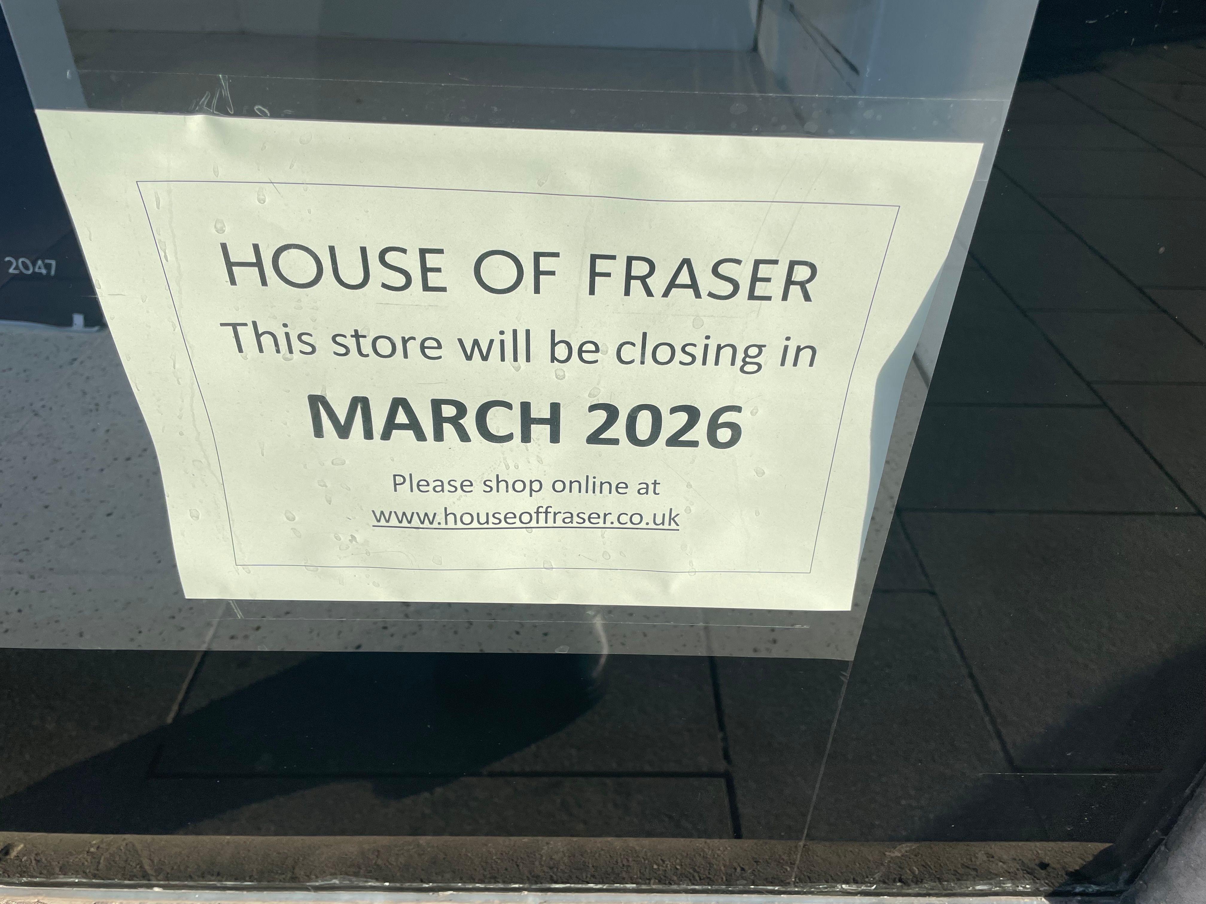 A sign in the shop window says the store will close in the spring.