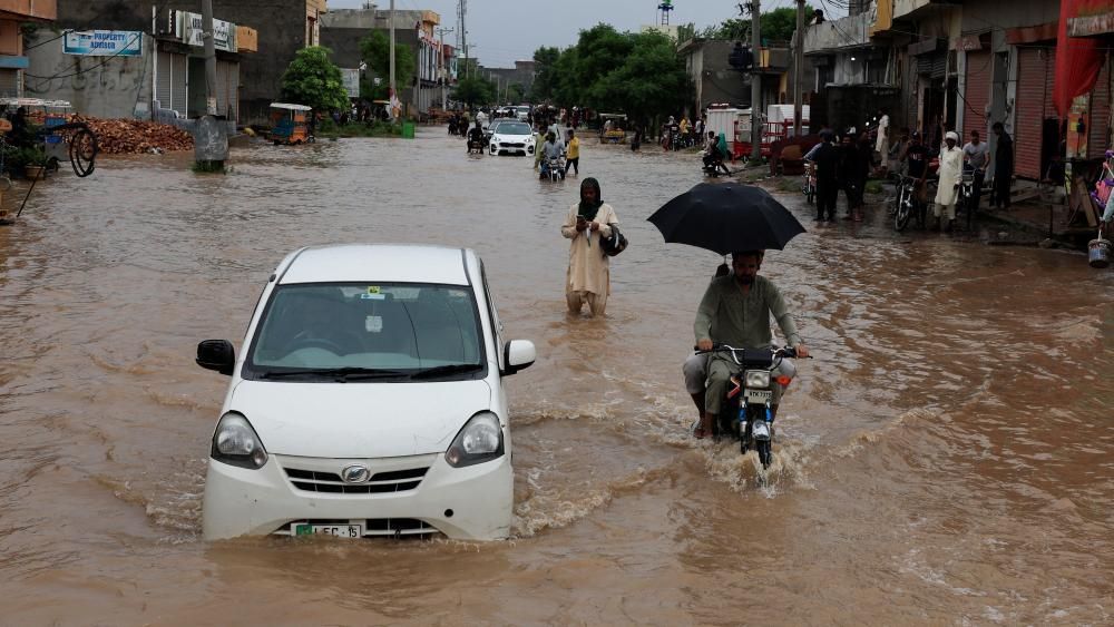 Pakistan Punjab flooding: Thousands evacuated after 'exceptionally high'  floods