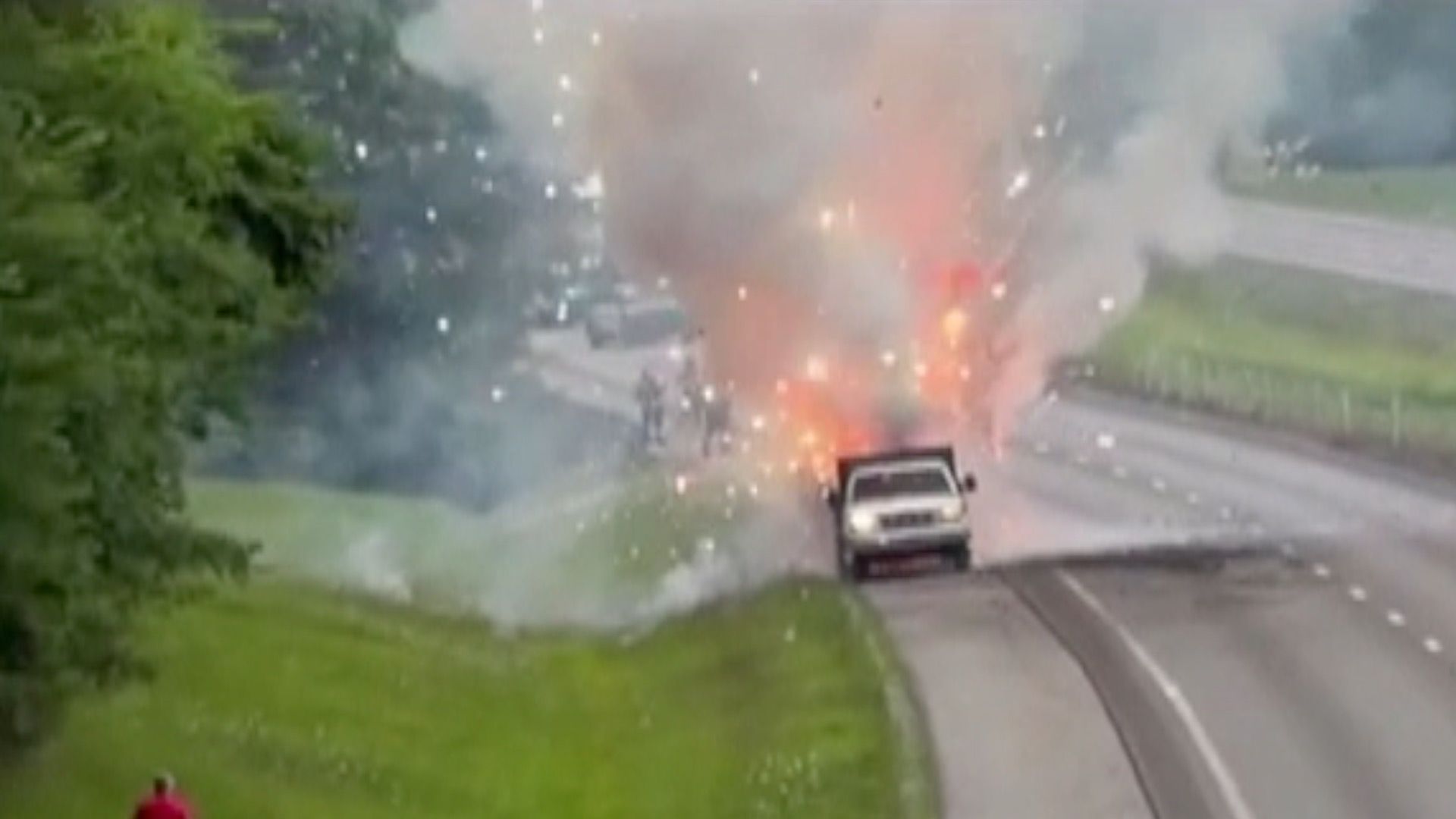 Truck carrying fireworks catches fire, sparking spectacular display