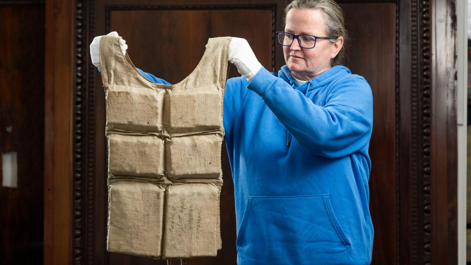 Life jacket worn by Titanic survivor at auction for £350,000