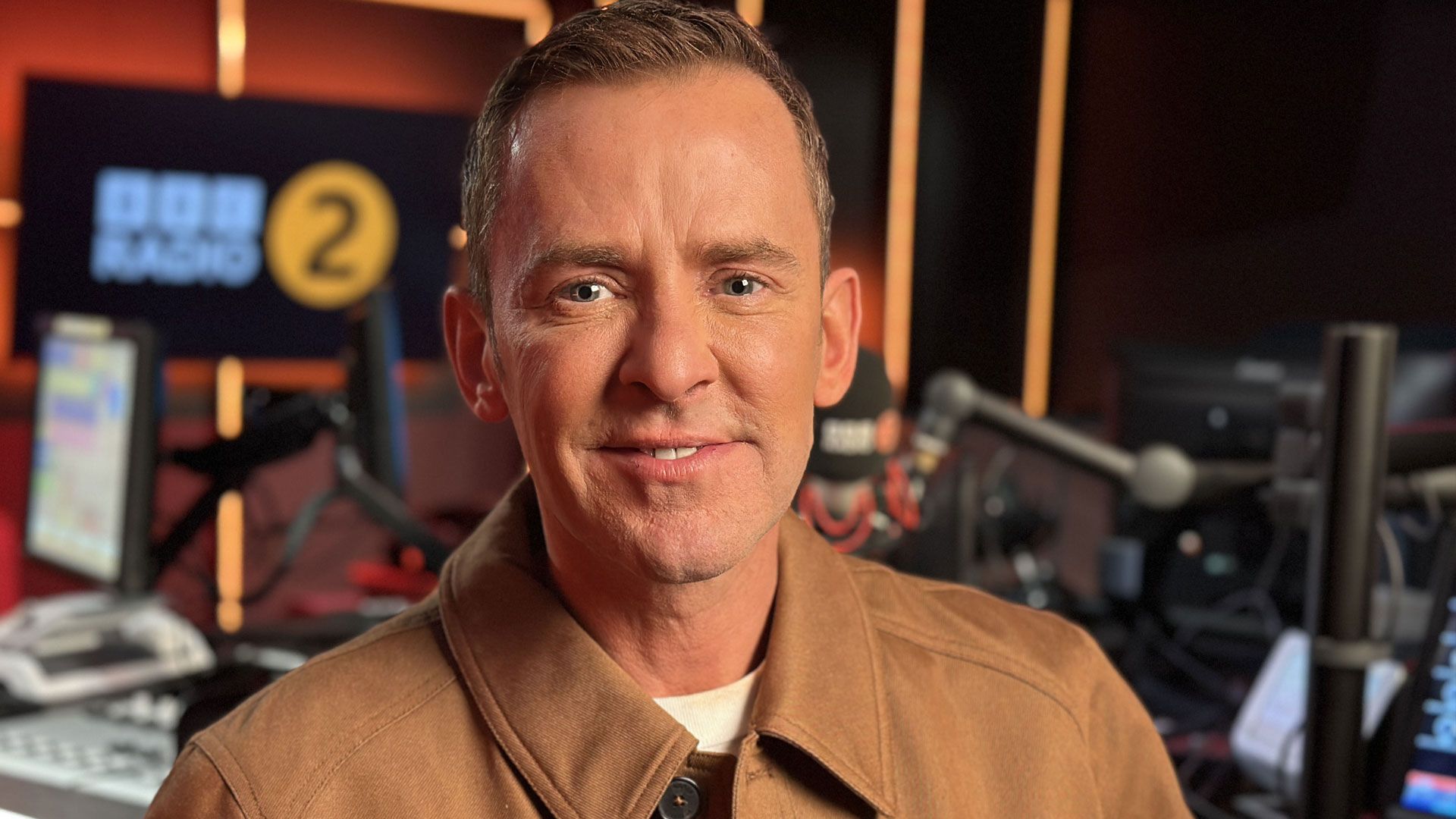 Scott Mills sacked from BBC Radio 2 after allegations over 'historic  relationship'