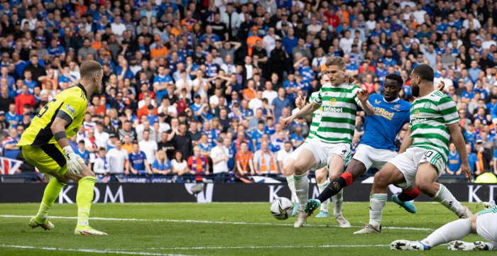 Cameron Carter-Vickers of Celtic tangles with Scott Wright of Rangers